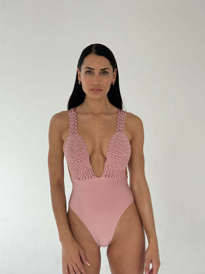 model wearing high quality mauve pink luxury macrame one-piece swimsuit from Agua Y Amor - can also be worn as a bodysuit